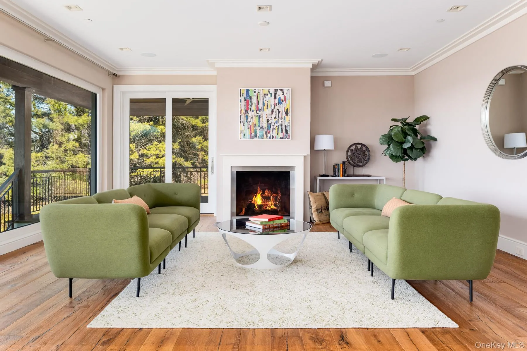The grand room has Italian oak flooring and gas fireplace . The grand room has Italian oak flooring and gas fireplace .
