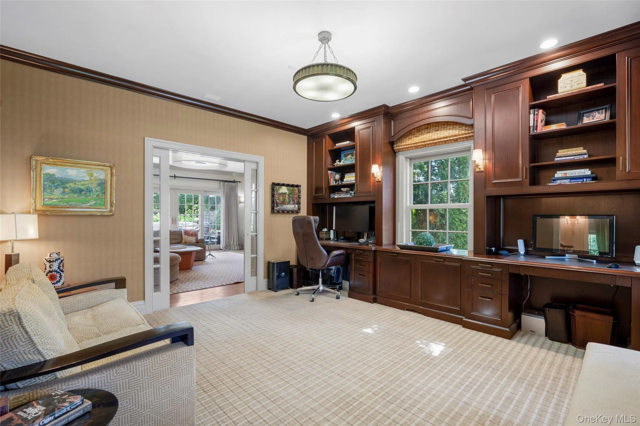 Custom built-in office cabinetry with 2 integrated desk spaces Custom built-in office cabinetry with 2 integrated desk spaces