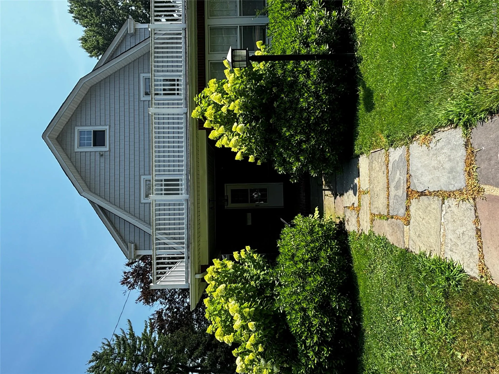 View of front of home featuring a gambrel roof View of front of home featuring a gambrel roof