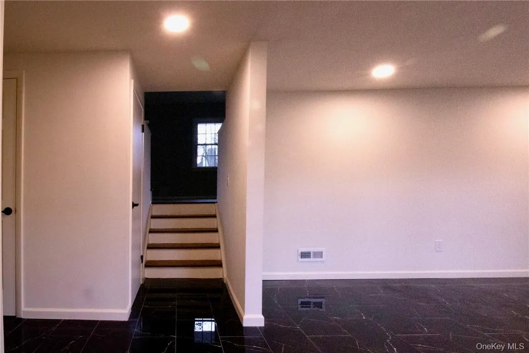 Stairs to open floor plan, Kitchen & family room. Stairs to open floor plan, Kitchen & family room.