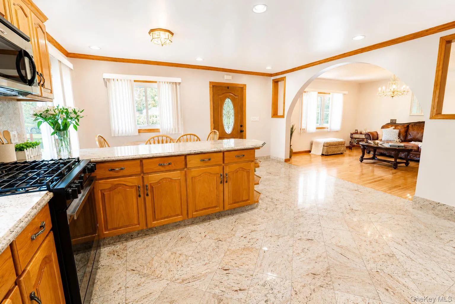 Kitchen boasts granite flooring and extensive counter space Kitchen boasts granite flooring and extensive counter space
