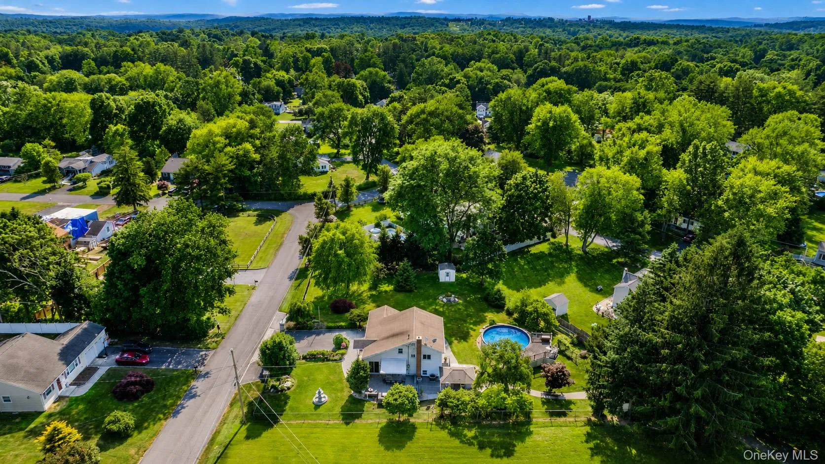 Another aerial view of the spacious property and surrounding area. Another aerial view of the spacious property and surrounding area.