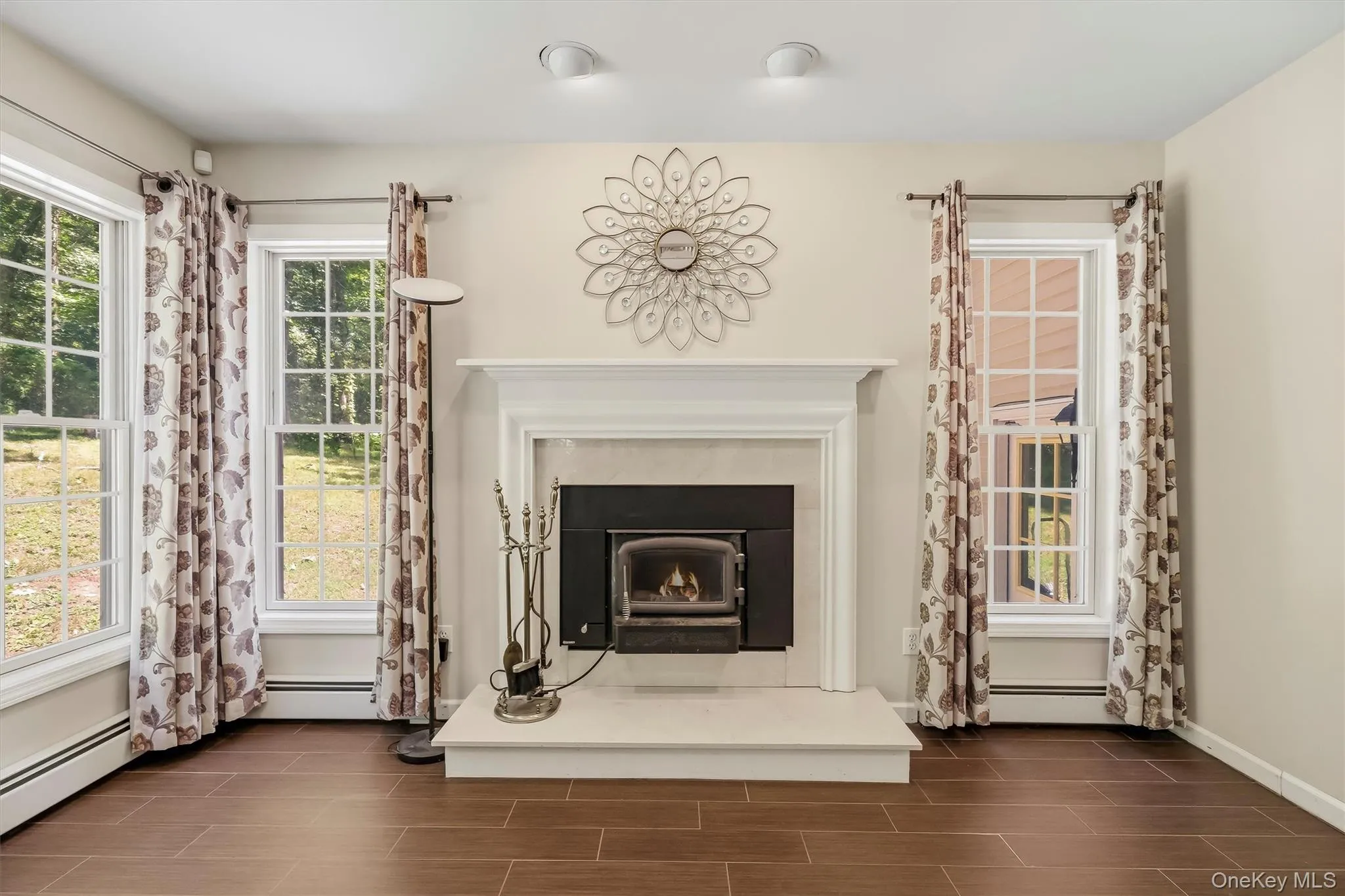 Sitting room off kitchen with ornate wood burning stove Sitting room off kitchen with ornate wood burning stove