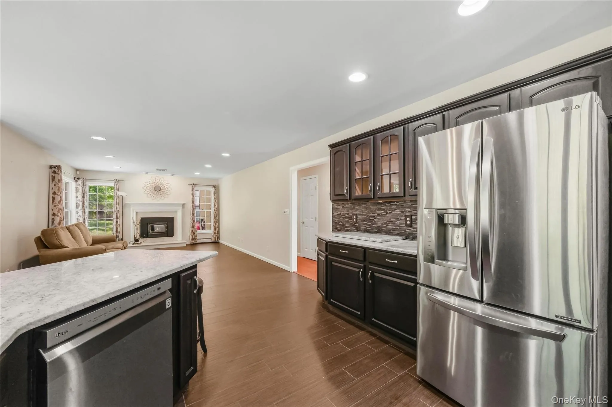 Chef's kitchen with granite countertops & stainless steel appliances Chef's kitchen with granite countertops & stainless steel appliances