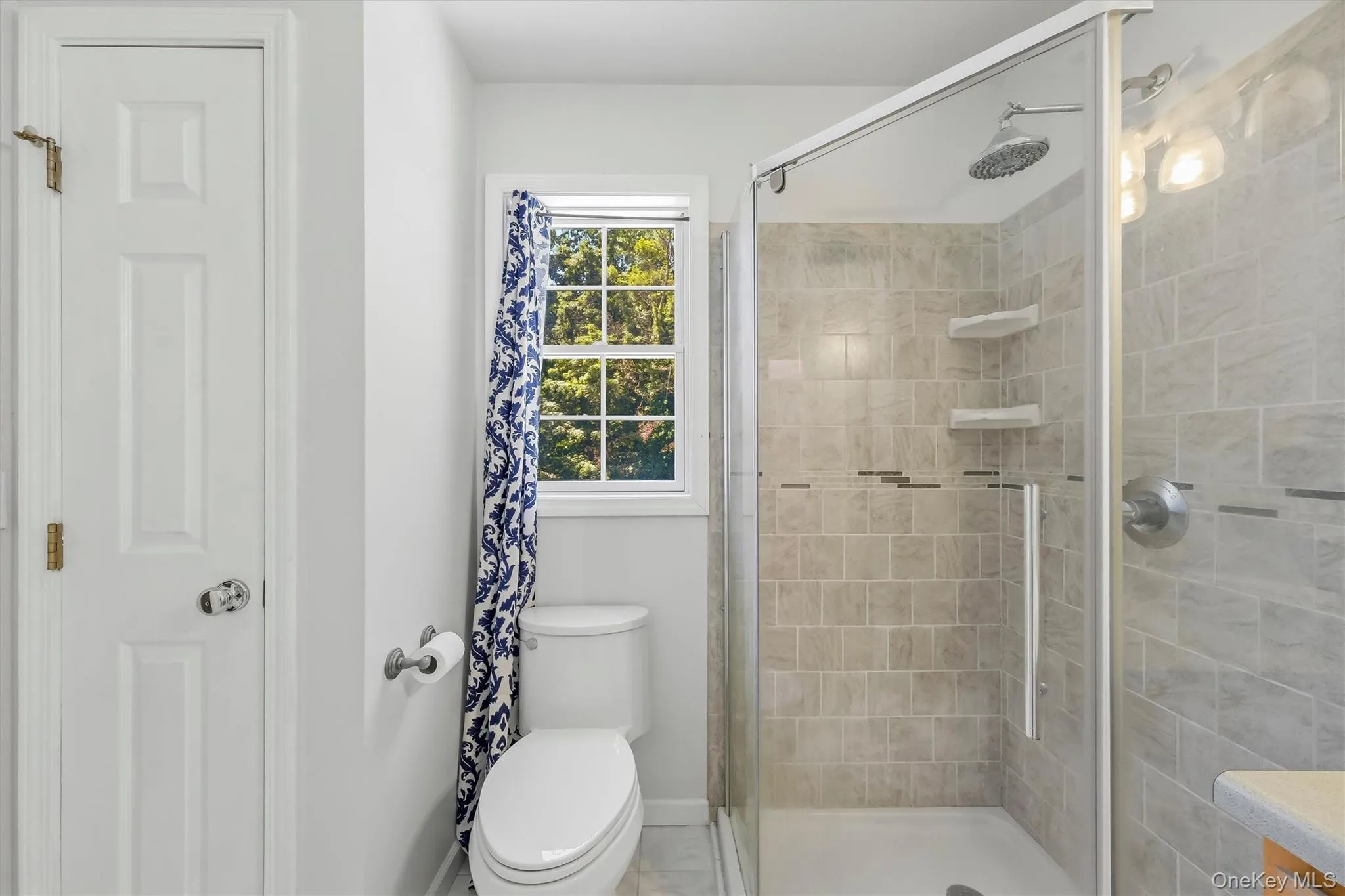 Primary bathroom with double vanity, jacuzzi tub & walk-in shower Primary bathroom with double vanity, jacuzzi tub & walk-in shower