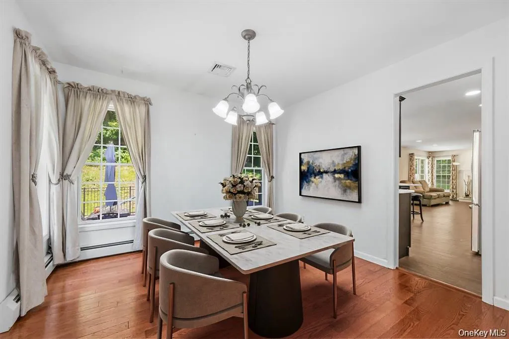 Virtually staged dining room Virtually staged dining room