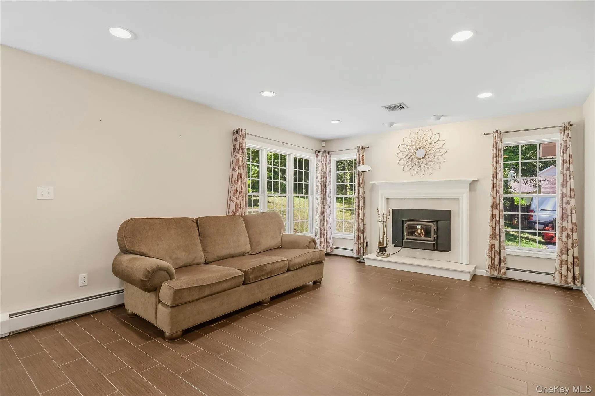 Sitting room off kitchen with ornate wood burning stove Sitting room off kitchen with ornate wood burning stove