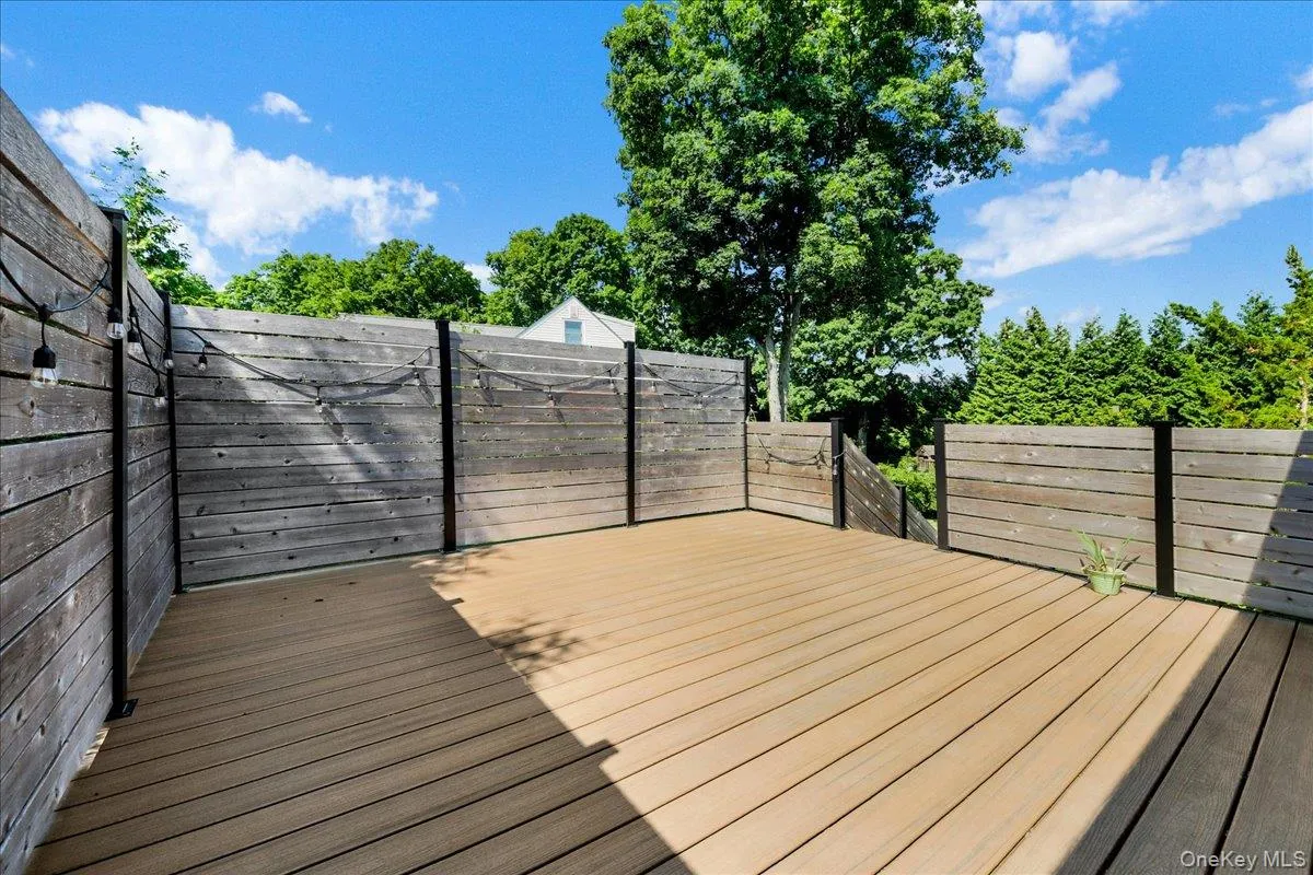 Private enclosed deck with access through primary bedroom Private enclosed deck with access through primary bedroom