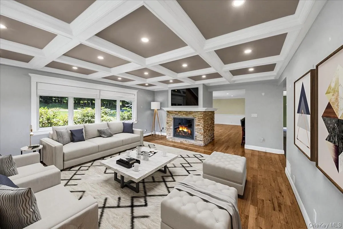 Second Living Room with beautifully decorated ceilings featuring recessed lighting, second fire-place and large windows throughout. Furniture has been virtually staged Second Living Room with beautifully decorated ceilings featuring recessed lighting, second fire-place and large windows throughout. Furniture has been virtually staged