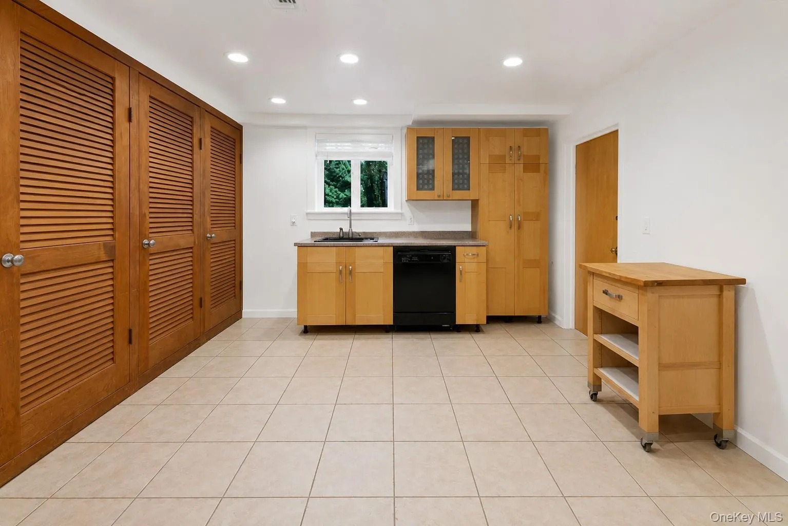 Finished Lower Level space equipped with bonus space, summer kitchen and full bathroom Finished Lower Level space equipped with bonus space, summer kitchen and full bathroom