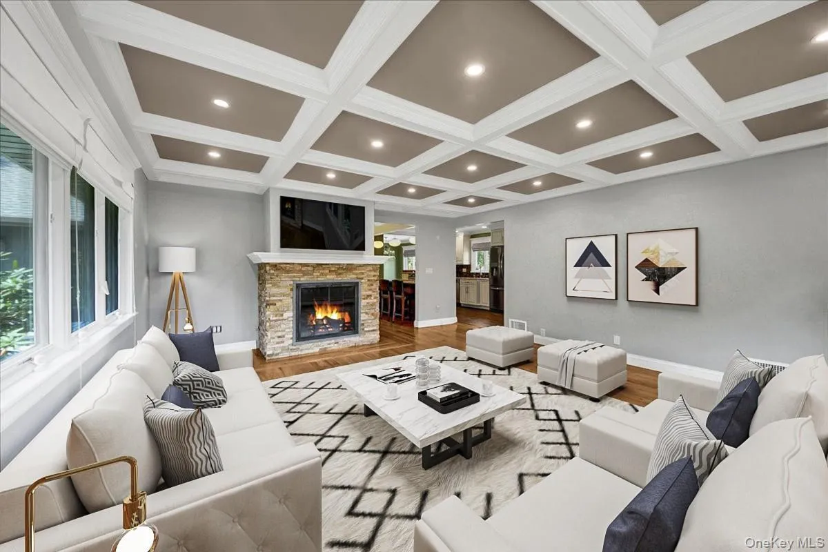 Second Living Room with beautifully decorated ceilings featuring recessed lighting, second fire-place and large windows throughout. Furniture has been virtually staged Second Living Room with beautifully decorated ceilings featuring recessed lighting, second fire-place and large windows throughout. Furniture has been virtually staged