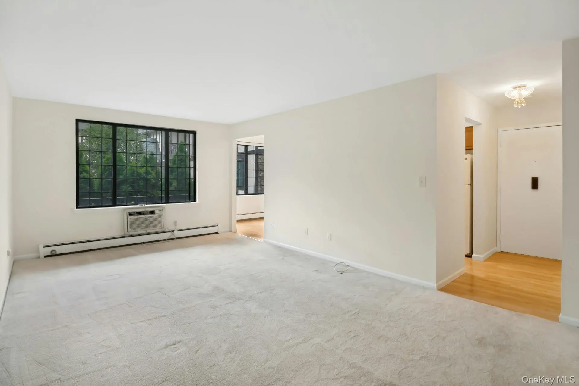 Spacious Living Room with Picture Window .. Entry Foyer to the Right. Spacious Living Room with Picture Window .. Entry Foyer to the Right.