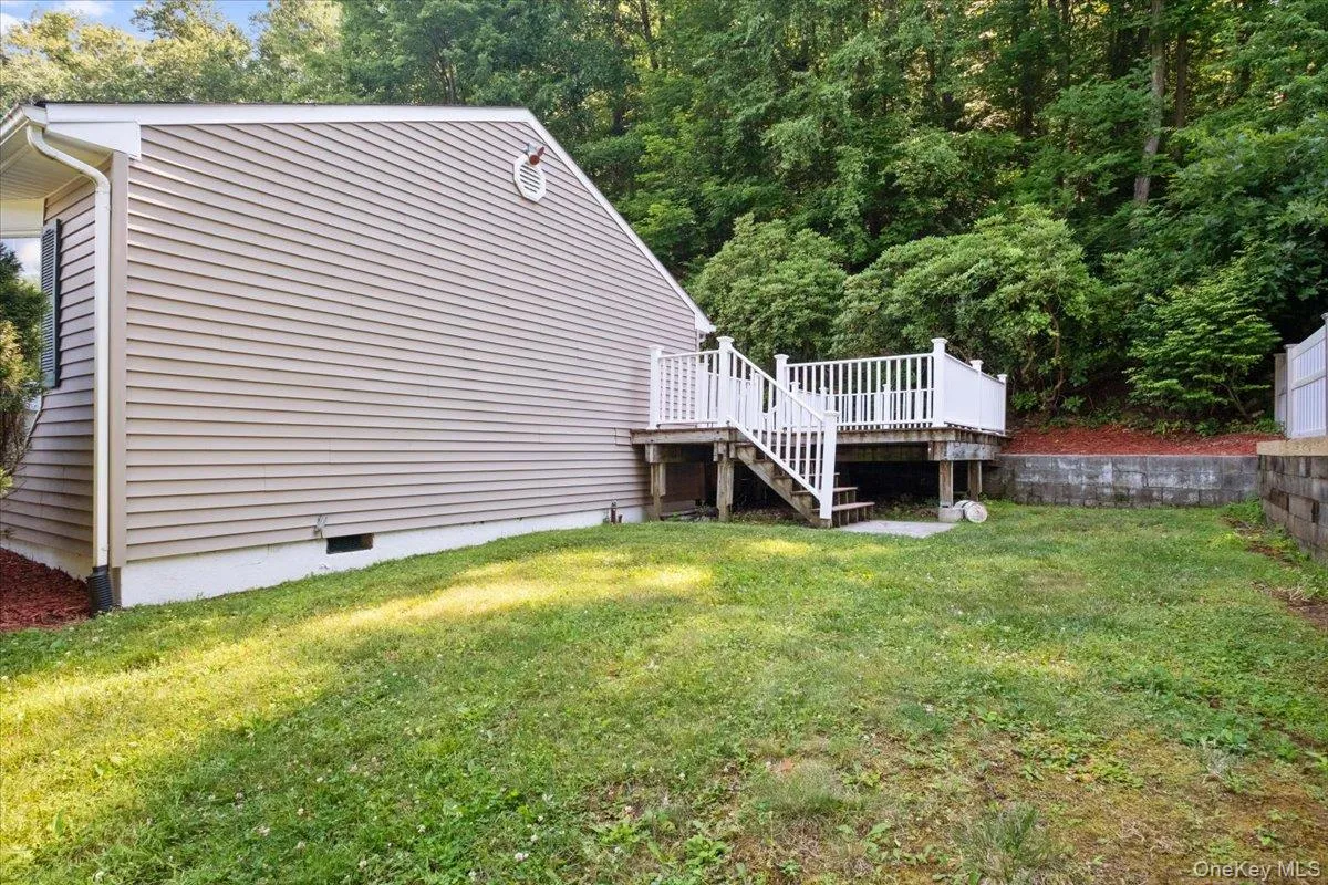 Right side yard, looking toward the deck. Right side yard, looking toward the deck.