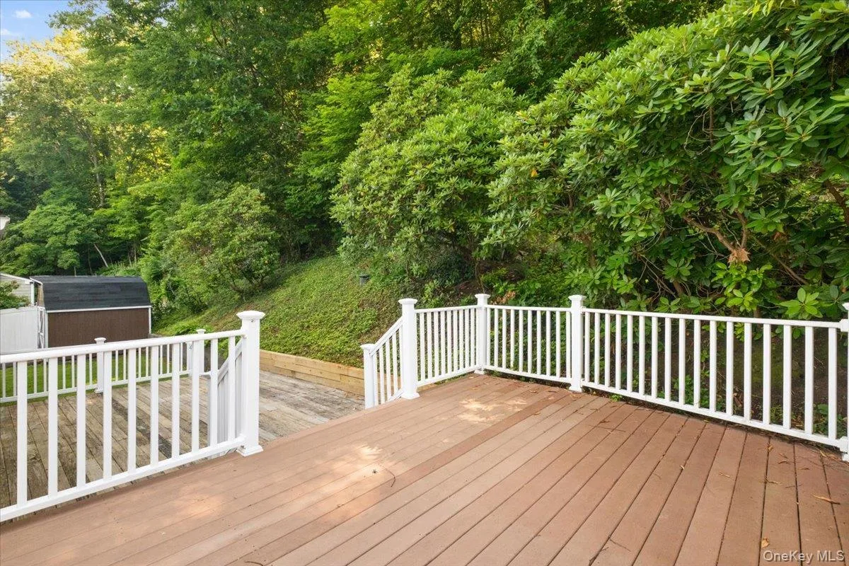 Upper deck with stairs to the back yard. Upper deck with stairs to the back yard.