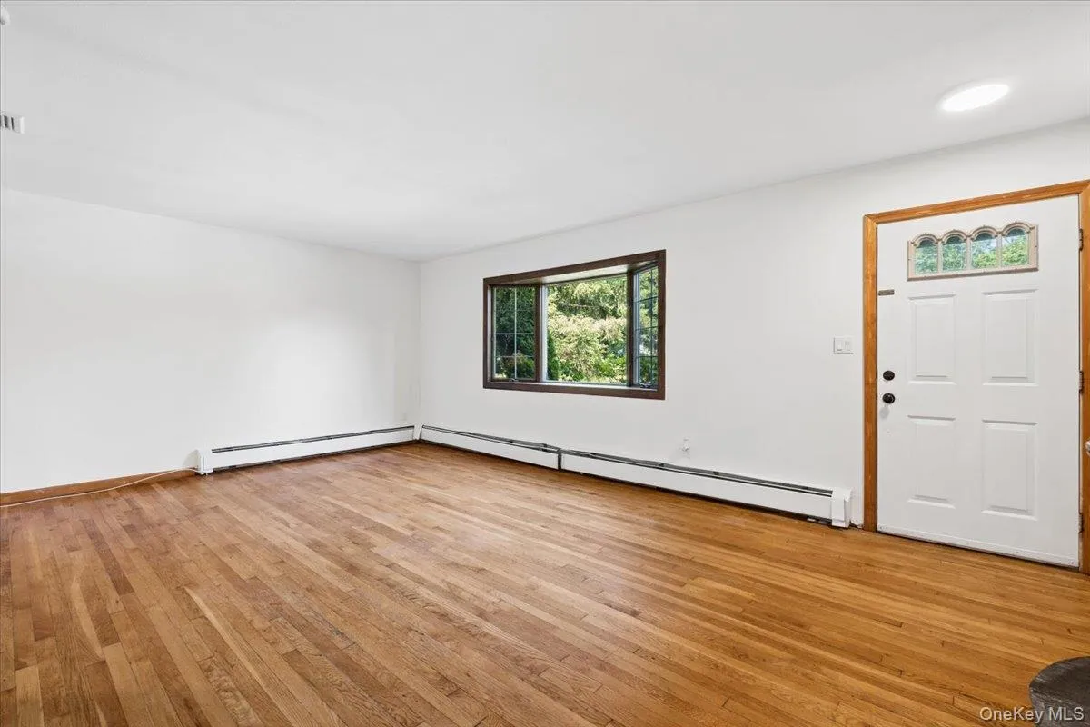 The picture window makes a perfect frame toward your expansive western facing front view. The picture window makes a perfect frame toward your expansive western facing front view.