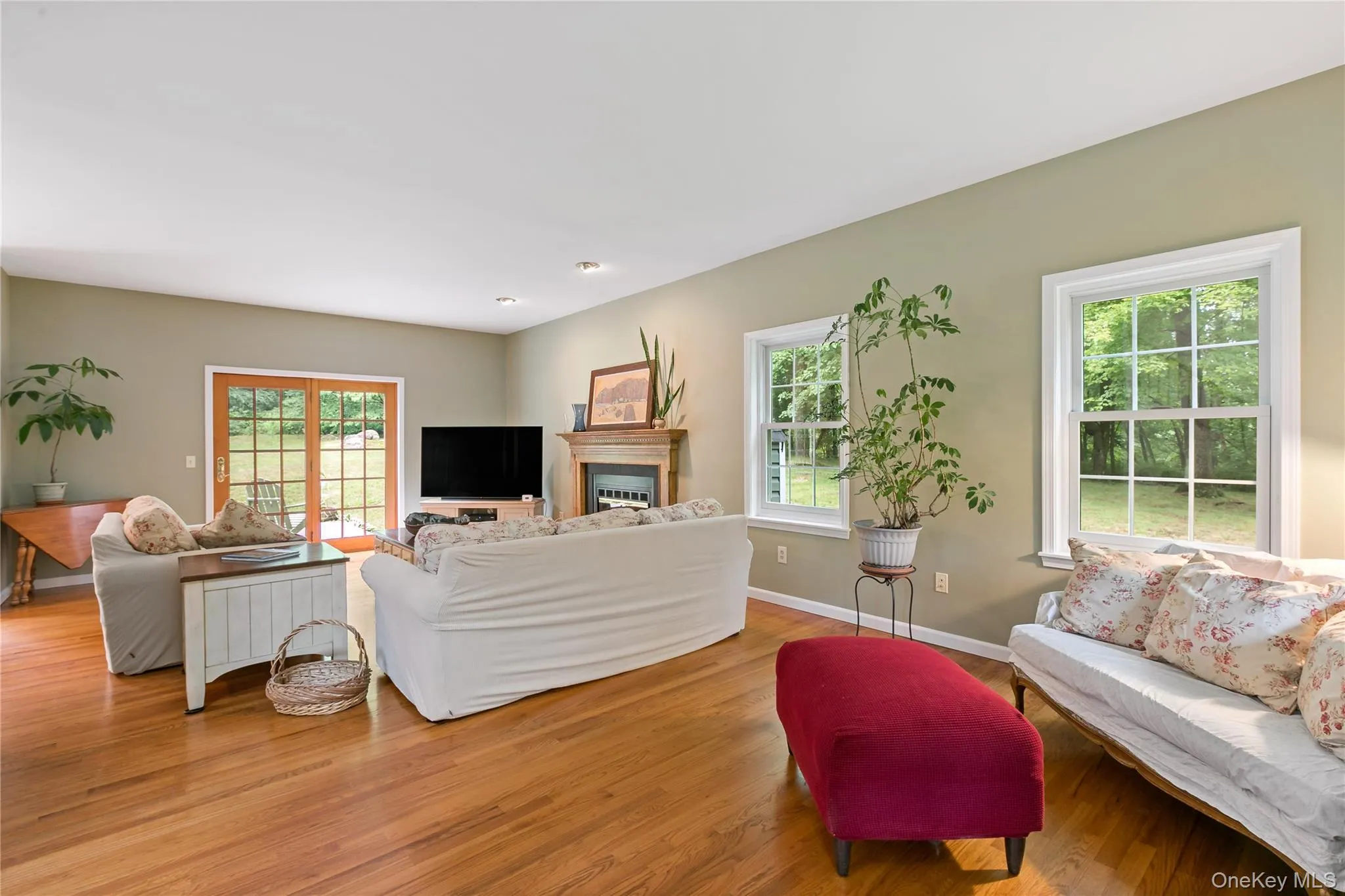Large living room divided into two sitting areas Large living room divided into two sitting areas