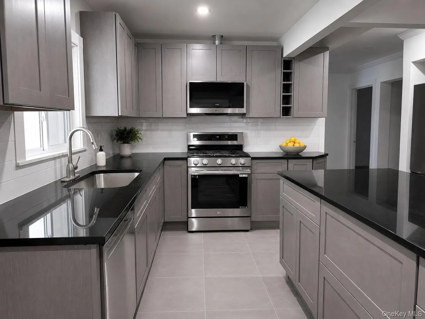 Beautiful new chef's kitchen (floor virtually added). Beautiful new chef's kitchen (floor virtually added).