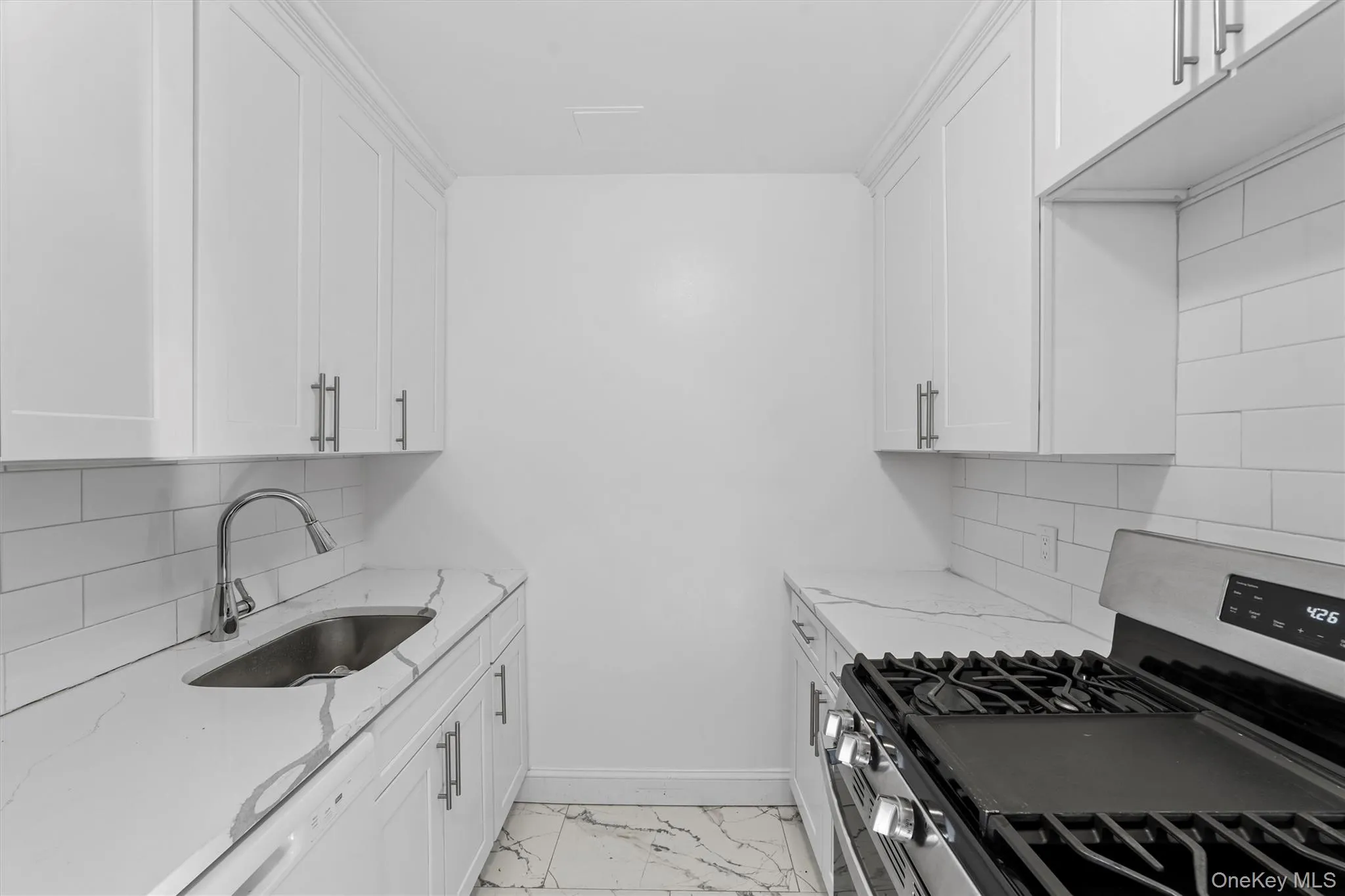 The updated kitchen features a gas stove., custom cabinets and custom countertops. The updated kitchen features a gas stove., custom cabinets and custom countertops.