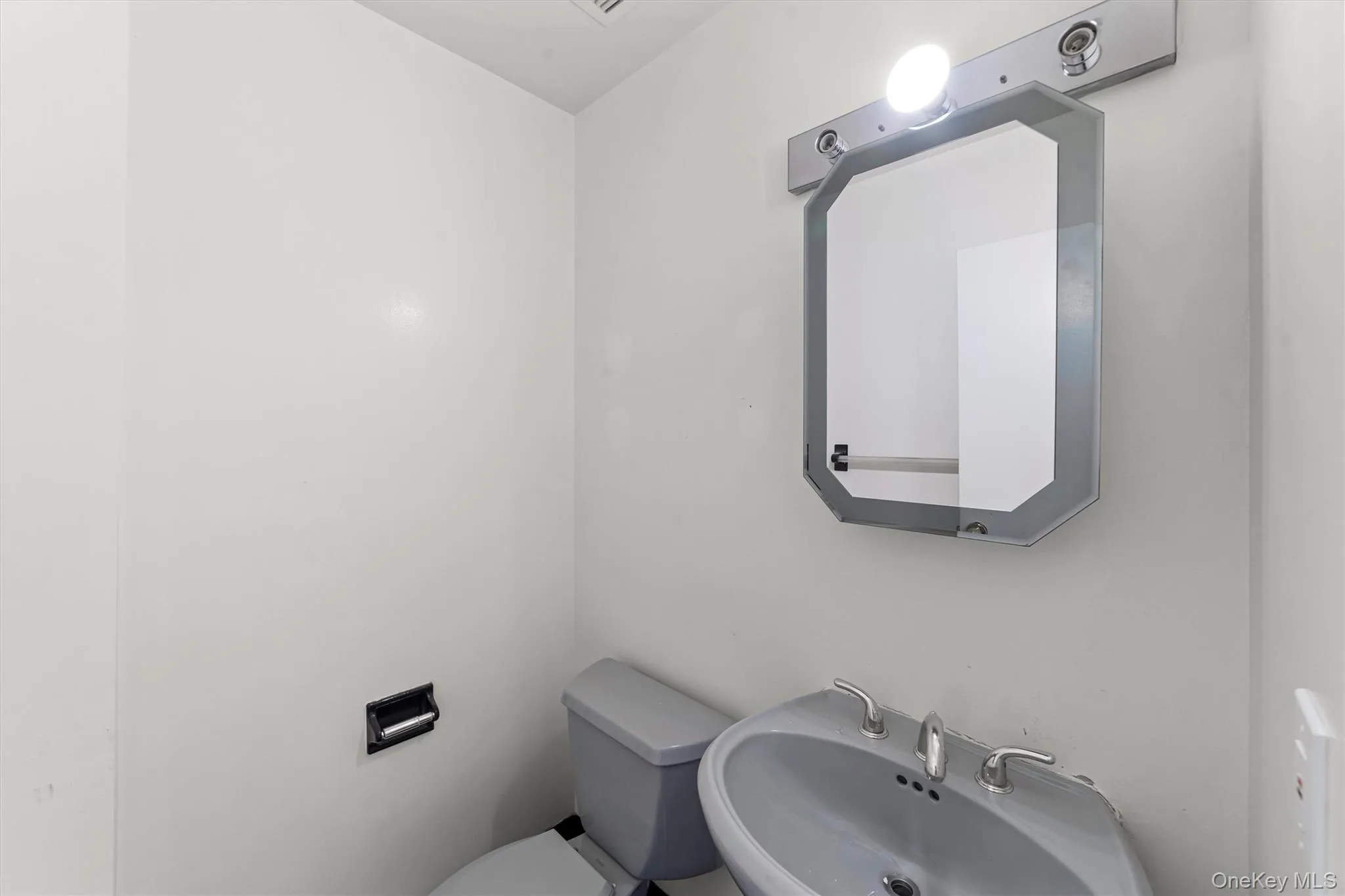 Main level powder room. Main level powder room.