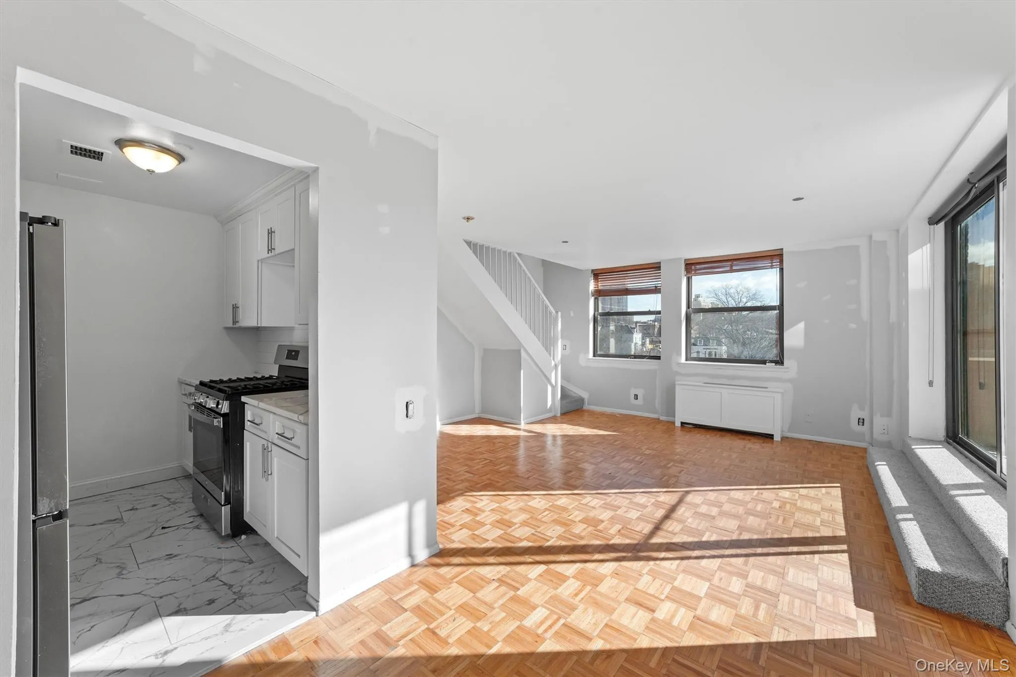 Spacious open floor plan with living room and dining room. Spacious open floor plan with living room and dining room.