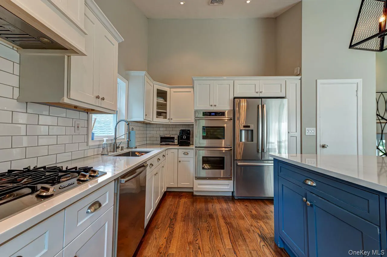 Updated open plan eat in kitchen with updated stainless appliances Updated open plan eat in kitchen with updated stainless appliances