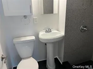Full Bathroom with a stall shower Full Bathroom with a stall shower