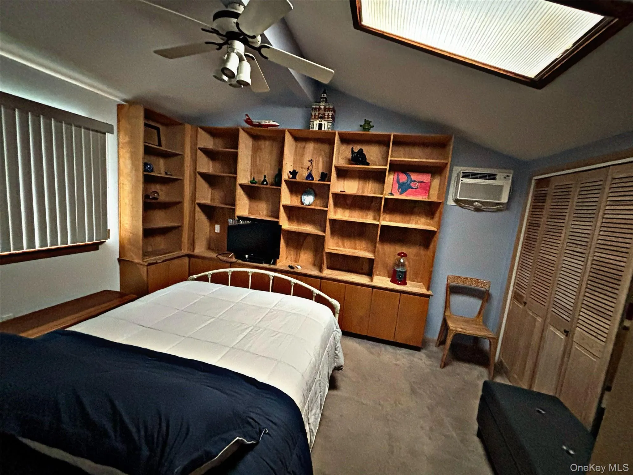 Bedroom #3- Upstairs with a Queen size bed, Closet, nightstand, chair.Vaulted ceilings, A/C Unit Bedroom #3- Upstairs with a Queen size bed, Closet, nightstand, chair.Vaulted ceilings, A/C Unit