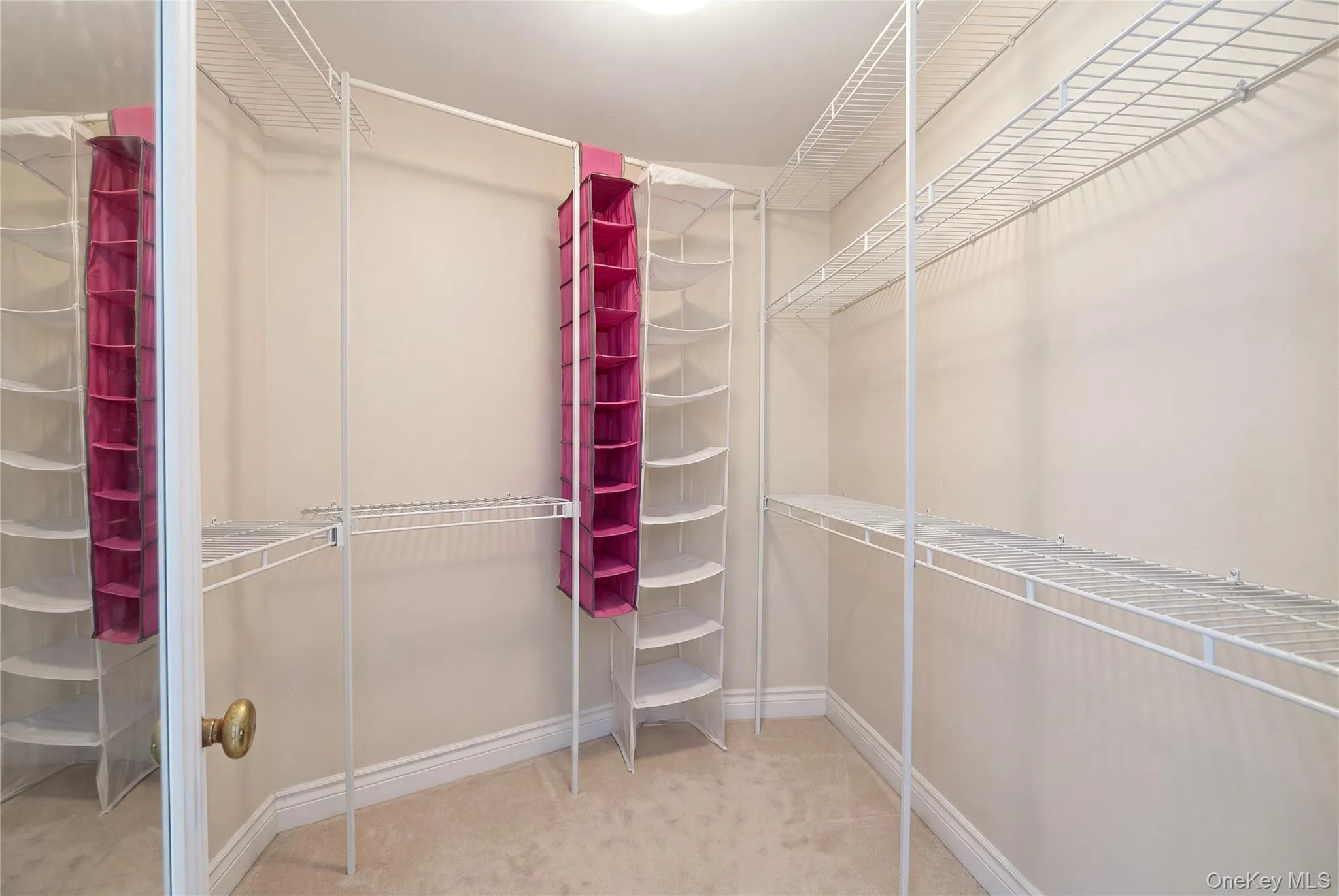 Primary walk in closet Primary walk in closet