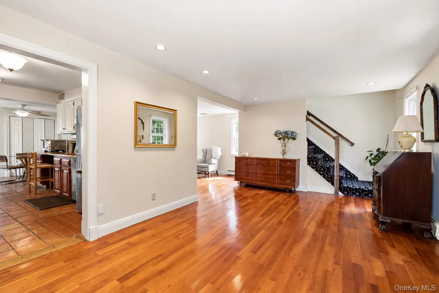 Living area with view towards staircase and upper level Living area with view towards staircase and upper level
