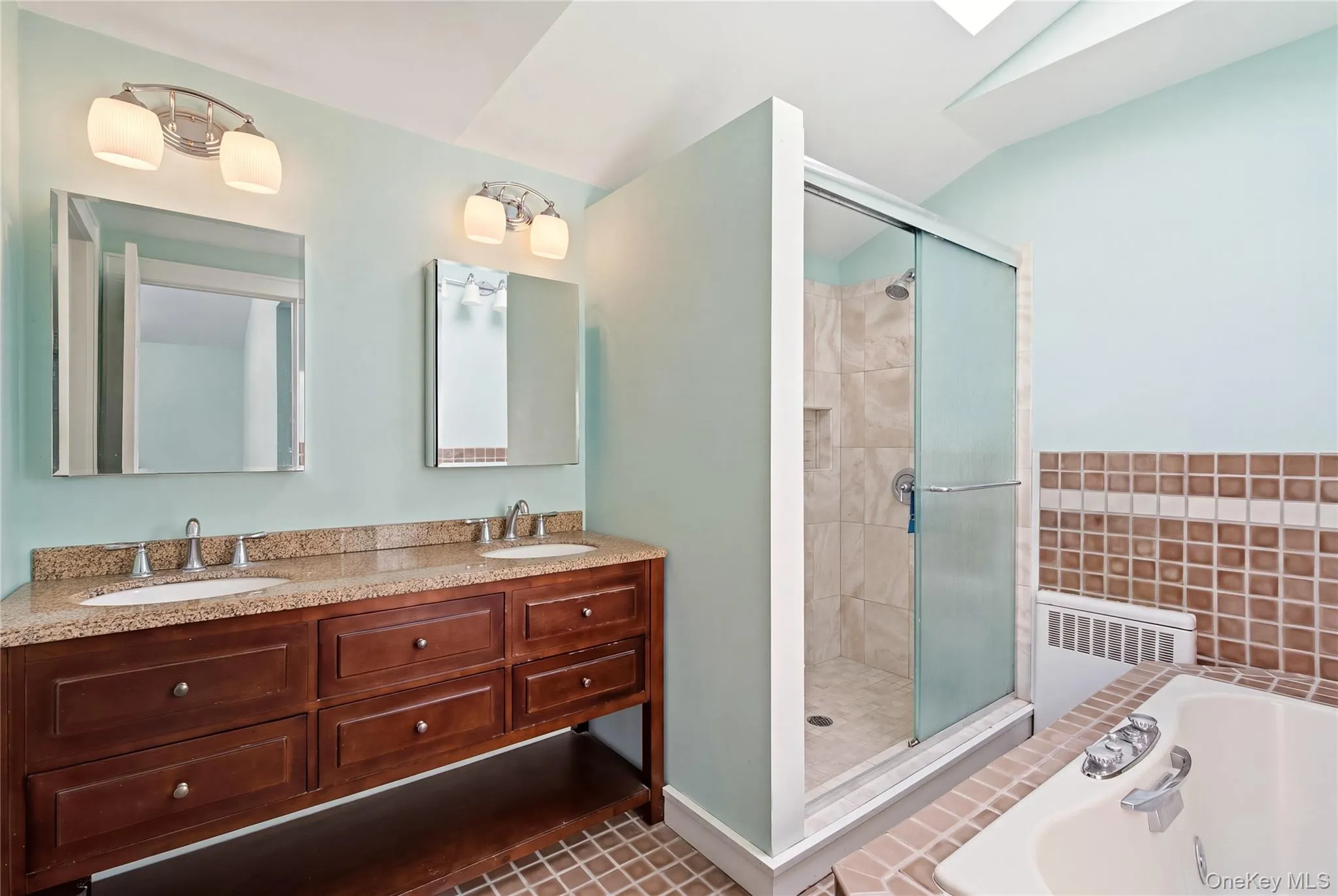 Primary bath and walk in shower Primary bath and walk in shower