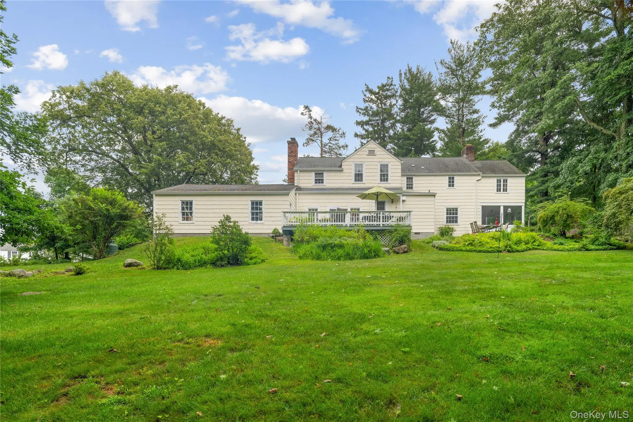 While very much a neighborhood cul-de-sac setting, the backyard is private and surrounded by towering trees While very much a neighborhood cul-de-sac setting, the backyard is private and surrounded by towering trees