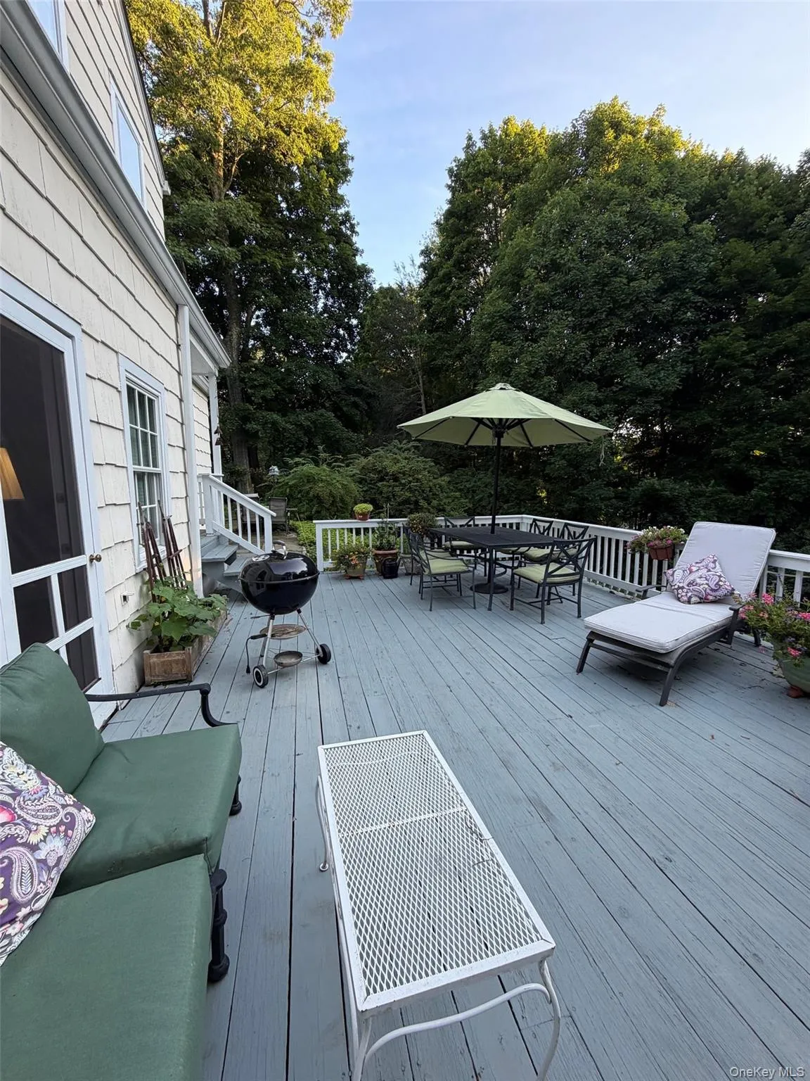 large deck accessed from kitchen and family room large deck accessed from kitchen and family room