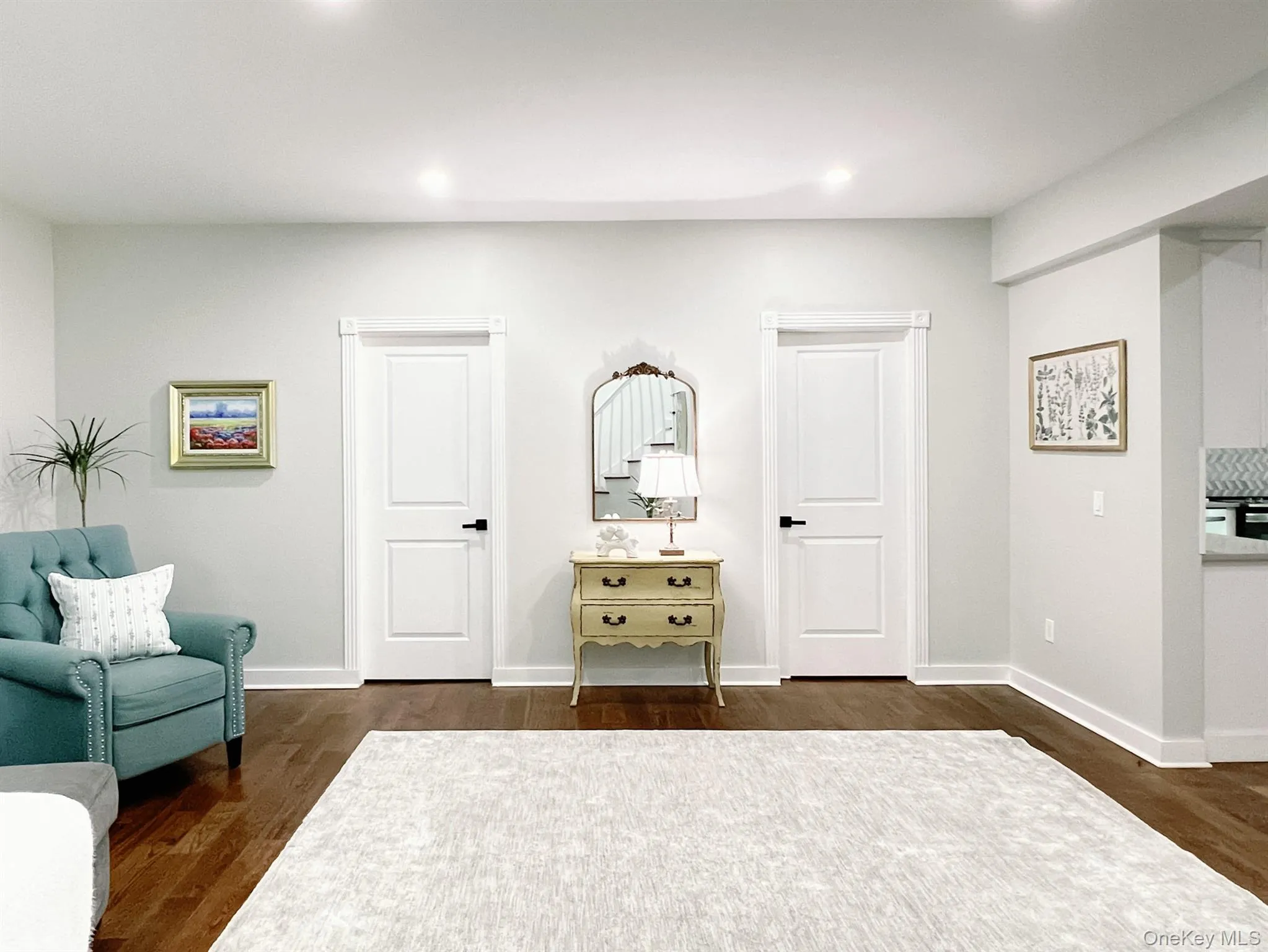 Spacious room for dining, or added living space, featuring rich hardwood flooring, recessed lighting, and two expansive walk-in closets Spacious room for dining, or added living space, featuring rich hardwood flooring, recessed lighting, and two expansive walk-in closets