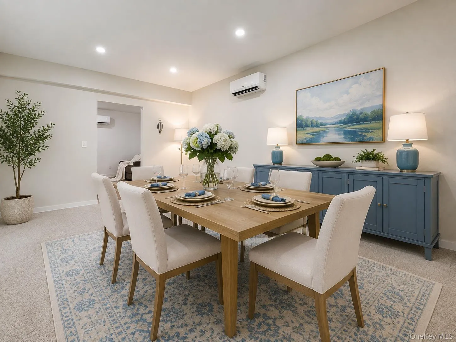 Living room virtually staged as the dining room Living room virtually staged as the dining room