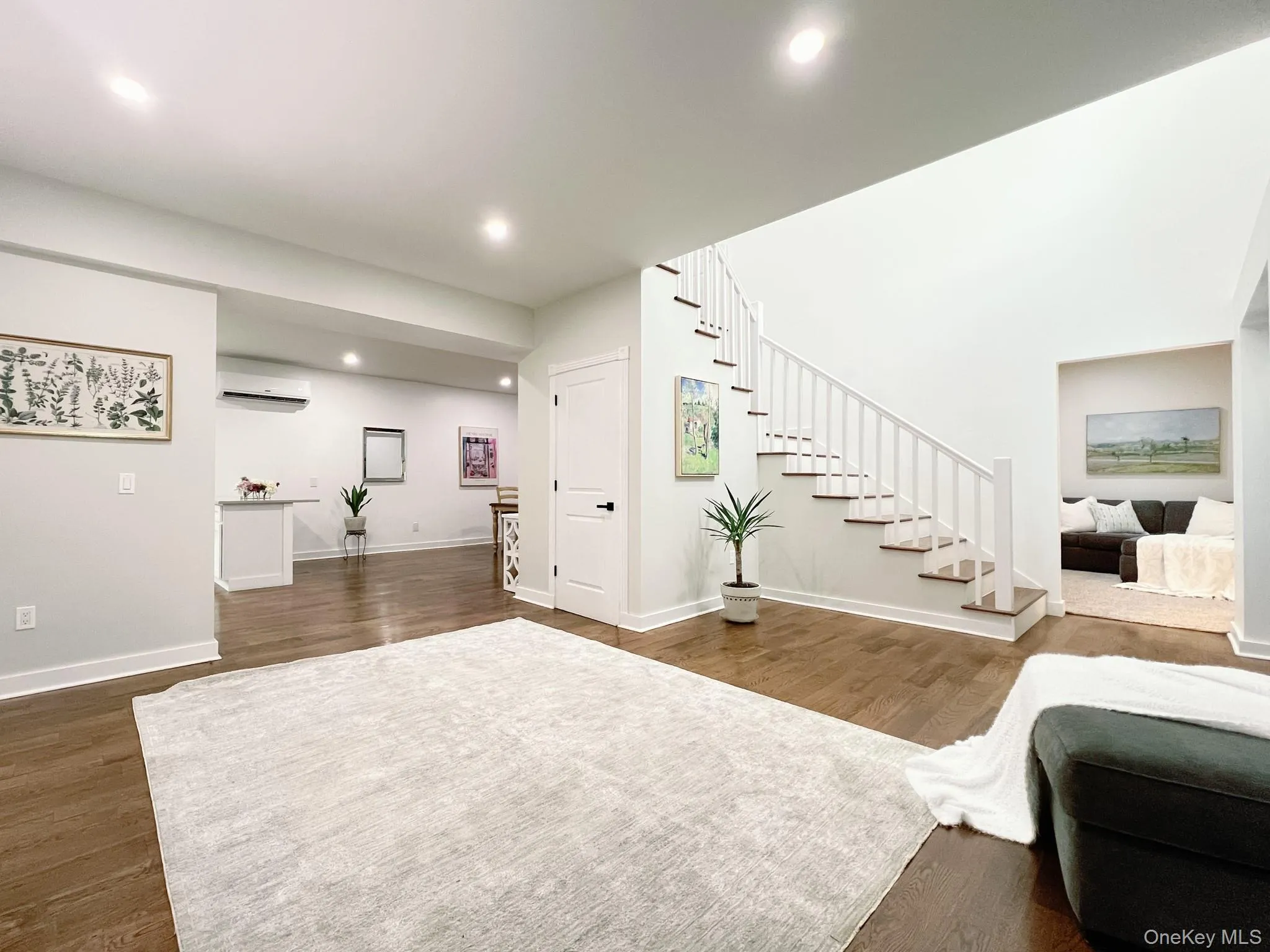 Grand entry foyer leads to a large flex space Grand entry foyer leads to a large flex space