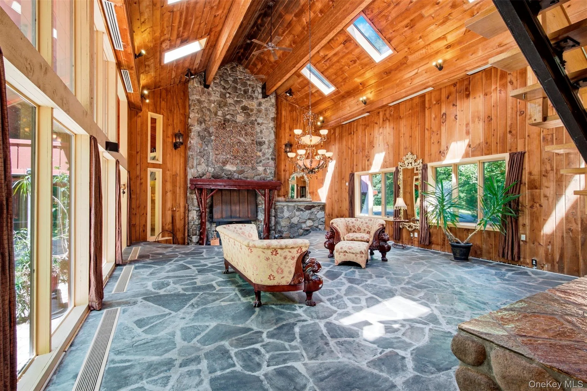 Great Room & 2-Story FIeldstone Fireplace Great Room & 2-Story FIeldstone Fireplace