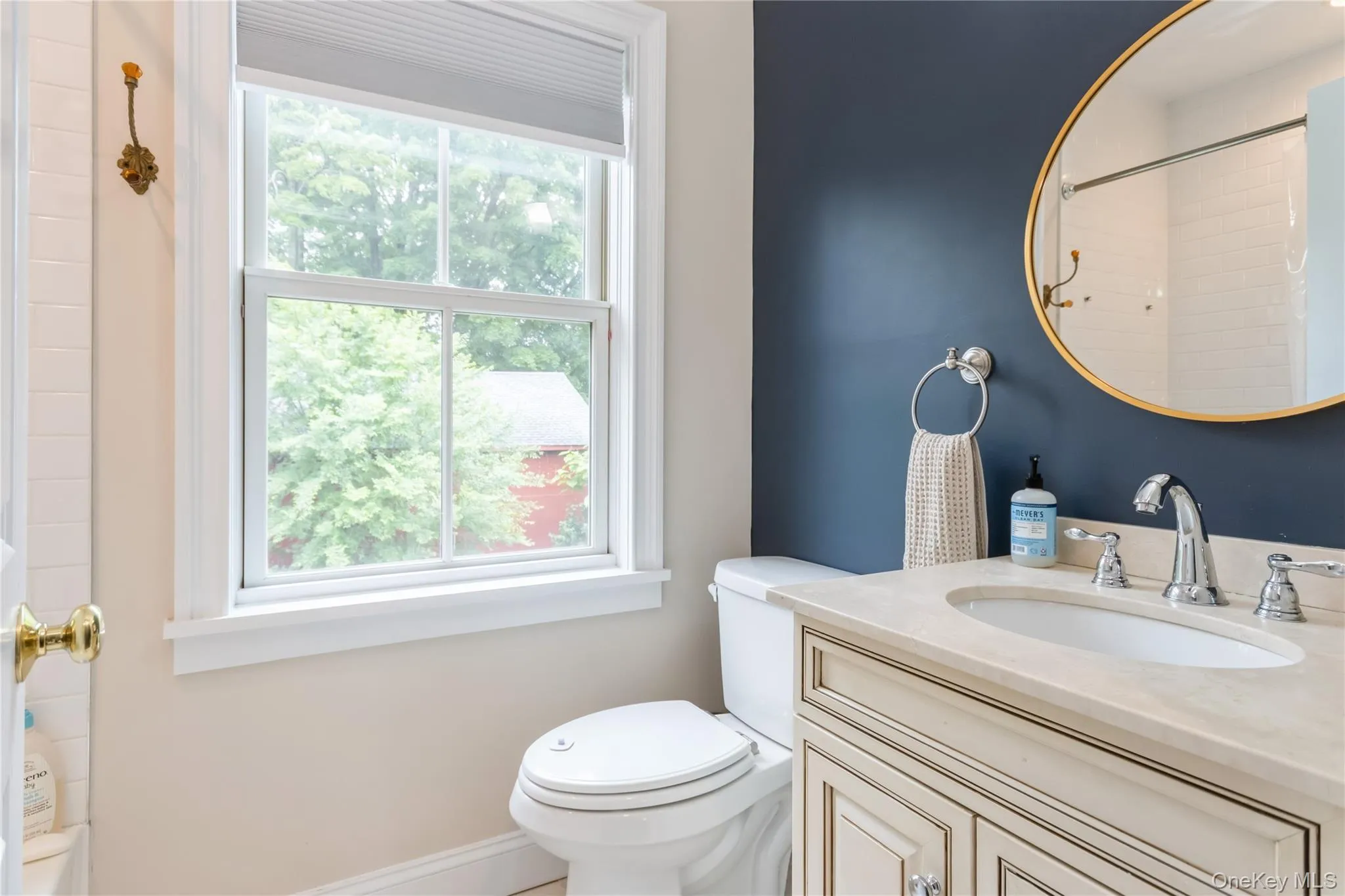 Full bath featuring vanity and a shower Full bath featuring vanity and a shower