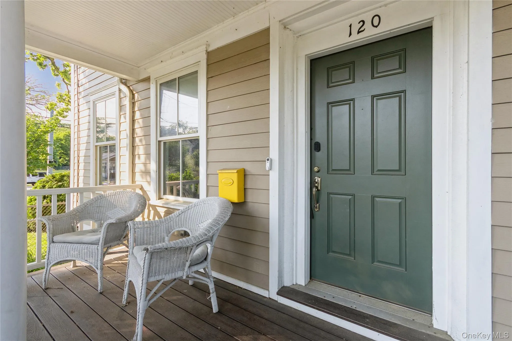 Property entrance featuring a porch Property entrance featuring a porch