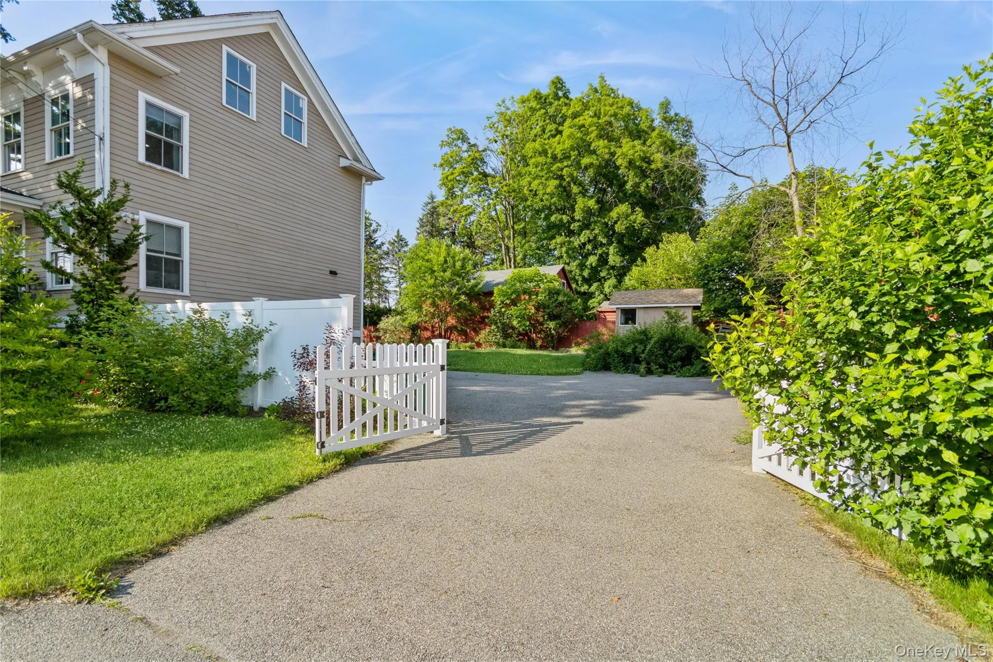 View of property exterior with driveway View of property exterior with driveway
