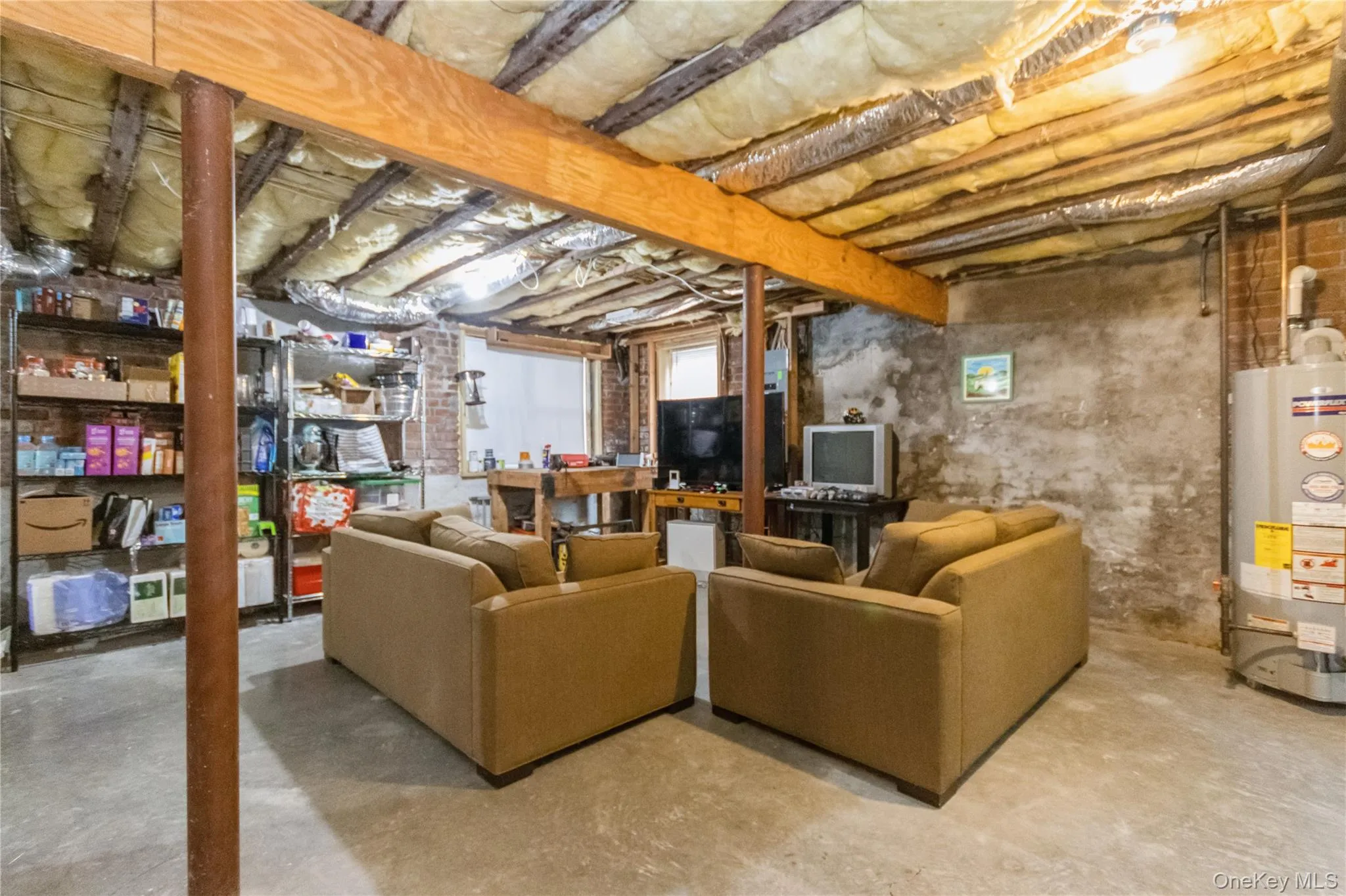 Basement featuring water heater Basement featuring water heater