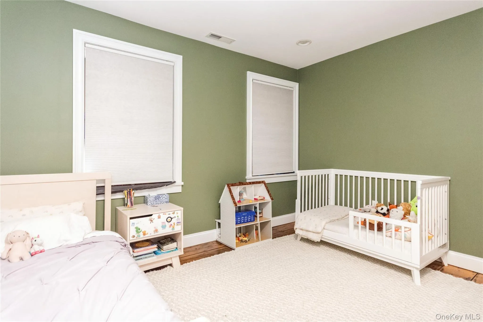 Bedroom featuring baseboards Bedroom featuring baseboards