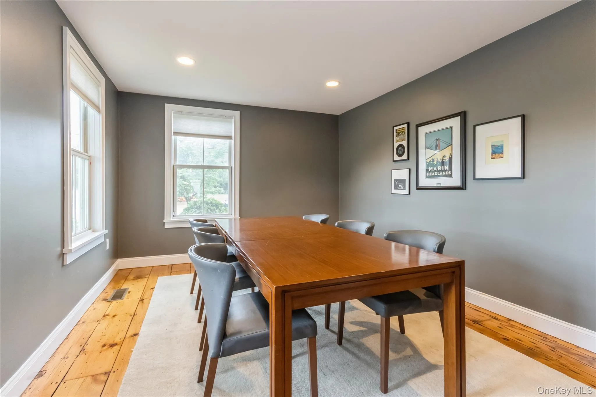Dining space with light wood-style floors, plenty of natural light, and recessed lighting Dining space with light wood-style floors, plenty of natural light, and recessed lighting