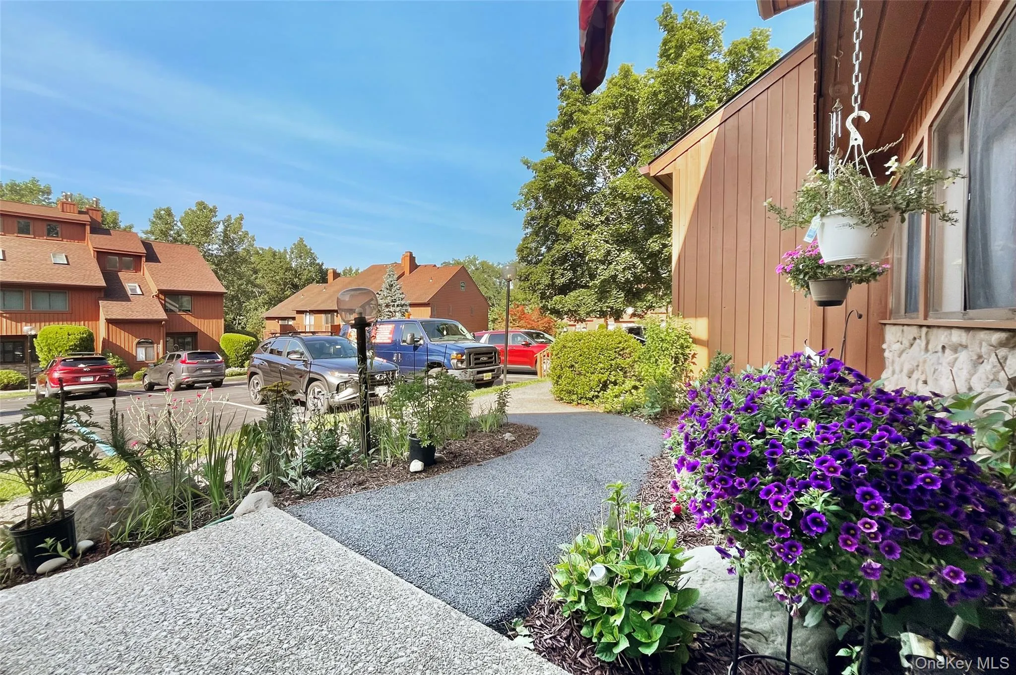 Beautiful Front Garden Area with established flowering plants Beautiful Front Garden Area with established flowering plants