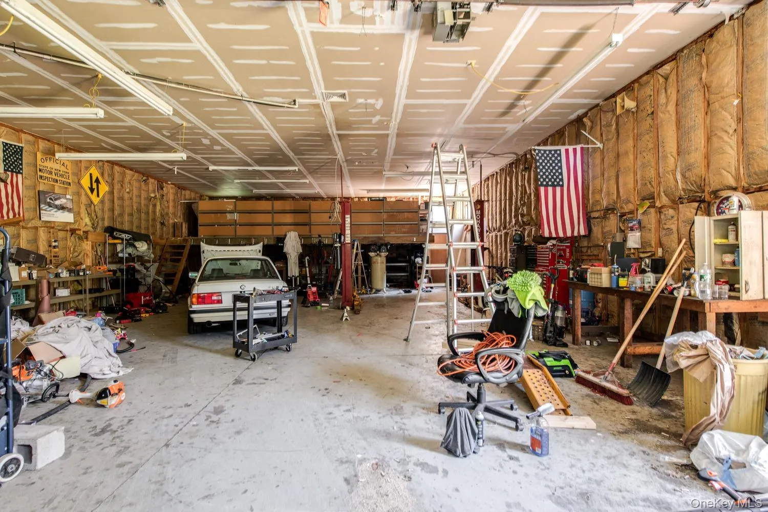 Oversized garage accommodates 6 cars Oversized garage accommodates 6 cars