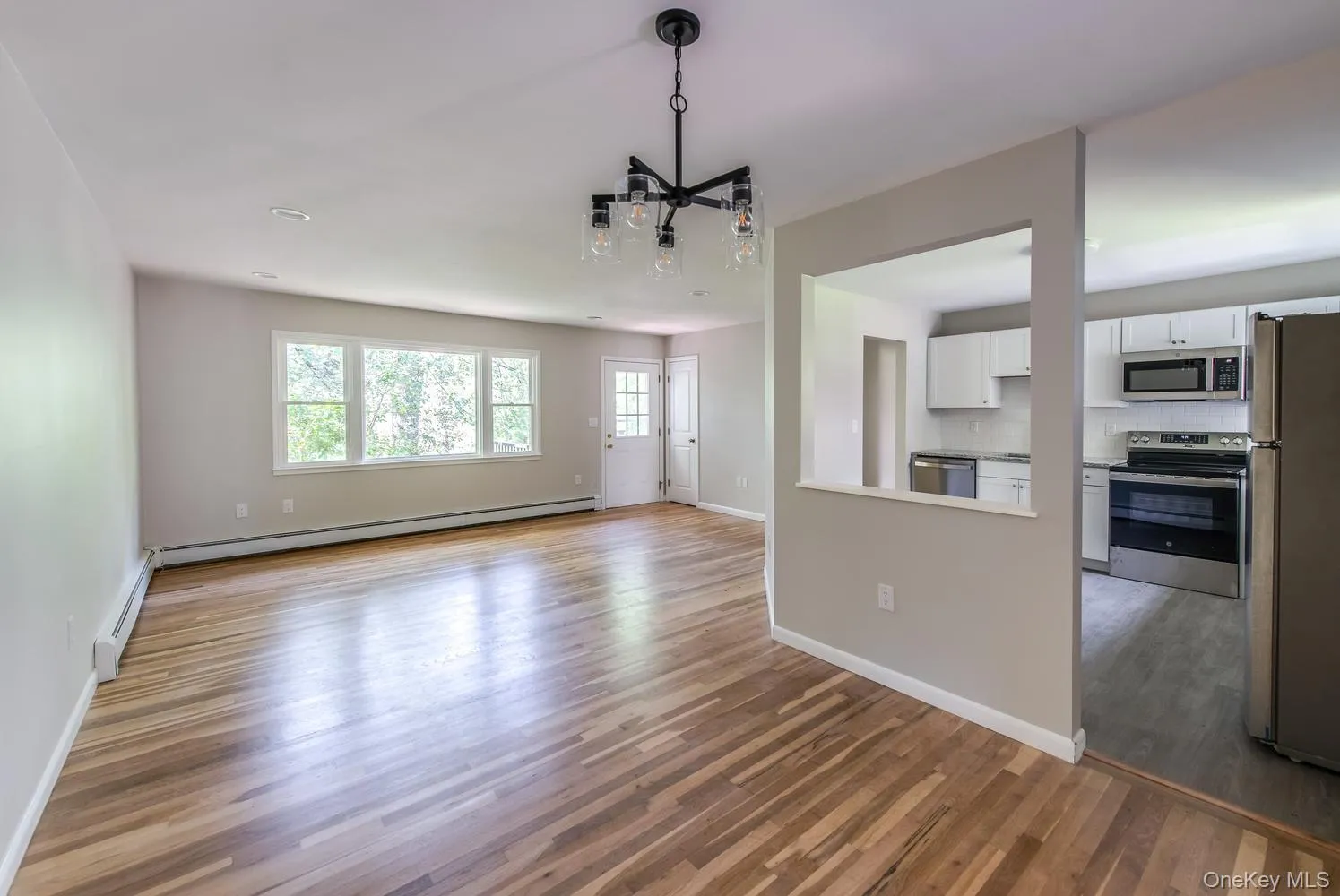 Nice flow from dining room to kitchen and living room Nice flow from dining room to kitchen and living room