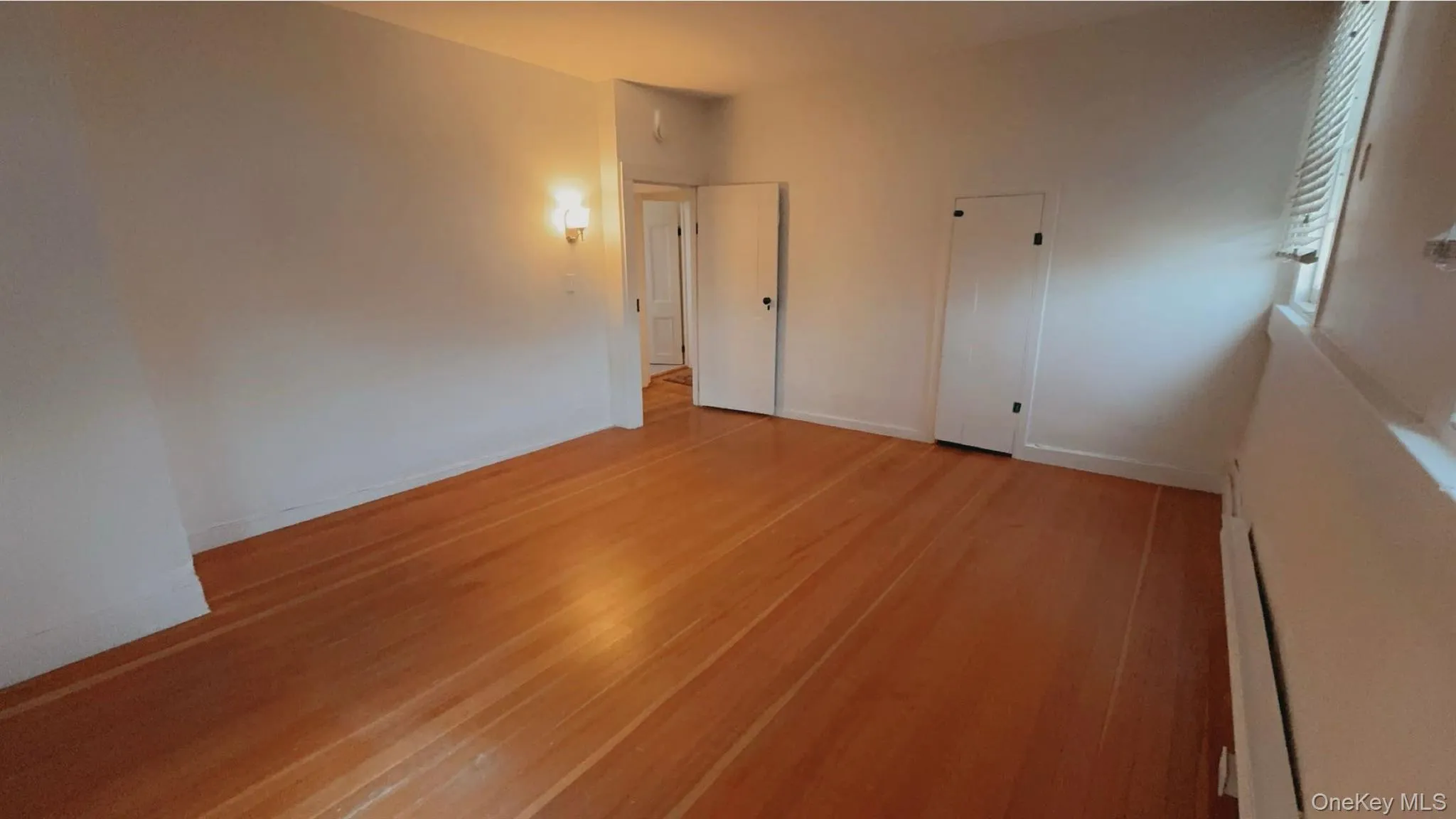 Spare room with light hardwood / wood-style flooring Spare room with light hardwood / wood-style flooring