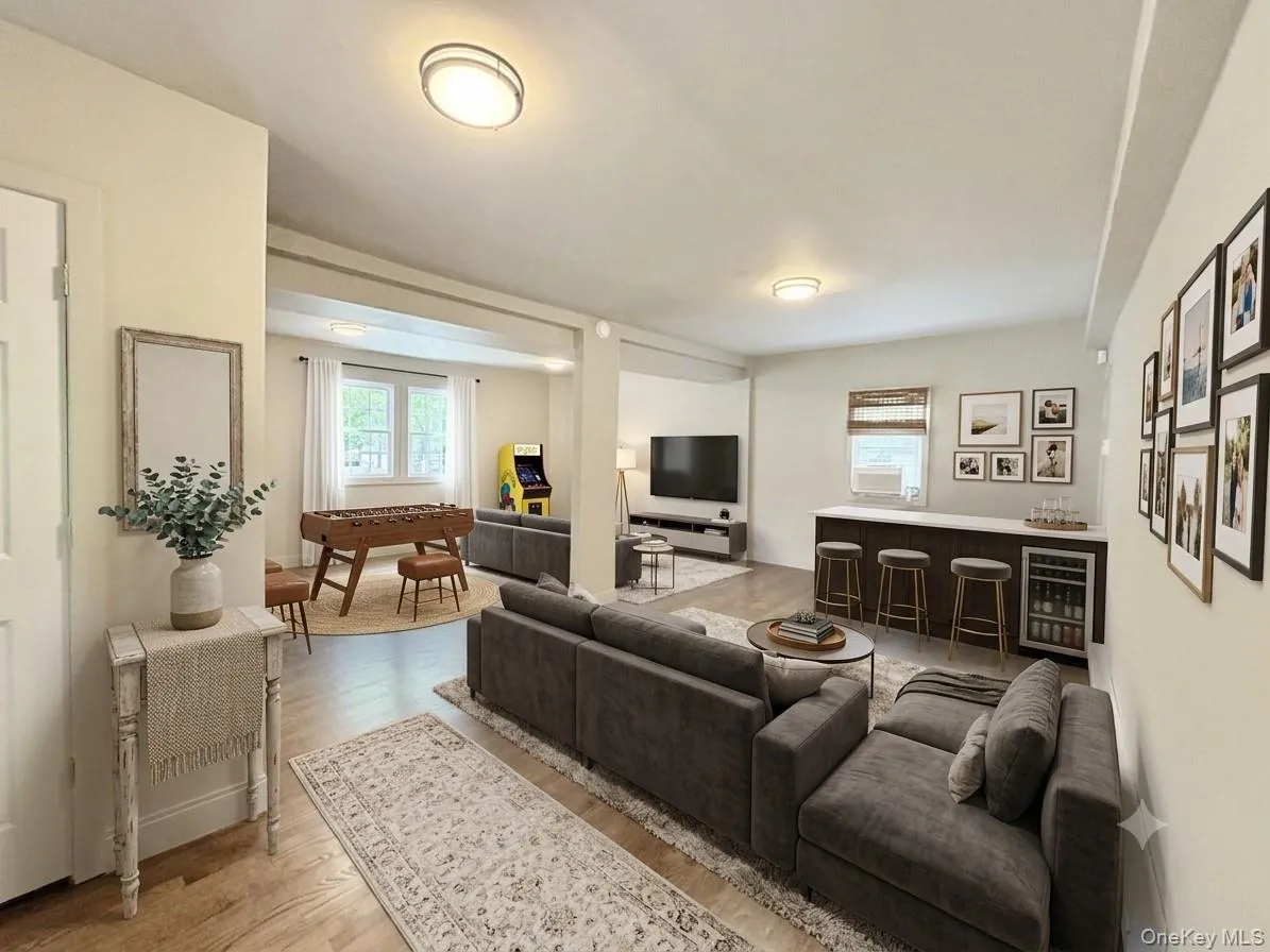 Flex Room: Virtually staged as Family Room/Rec Room/Gym/ Flex Room with 1/2 Bath and separate entrance. Multi-Use purpose building. Flex Room: Virtually staged as Family Room/Rec Room/Gym/ Flex Room with 1/2 Bath and separate entrance. Multi-Use purpose building.