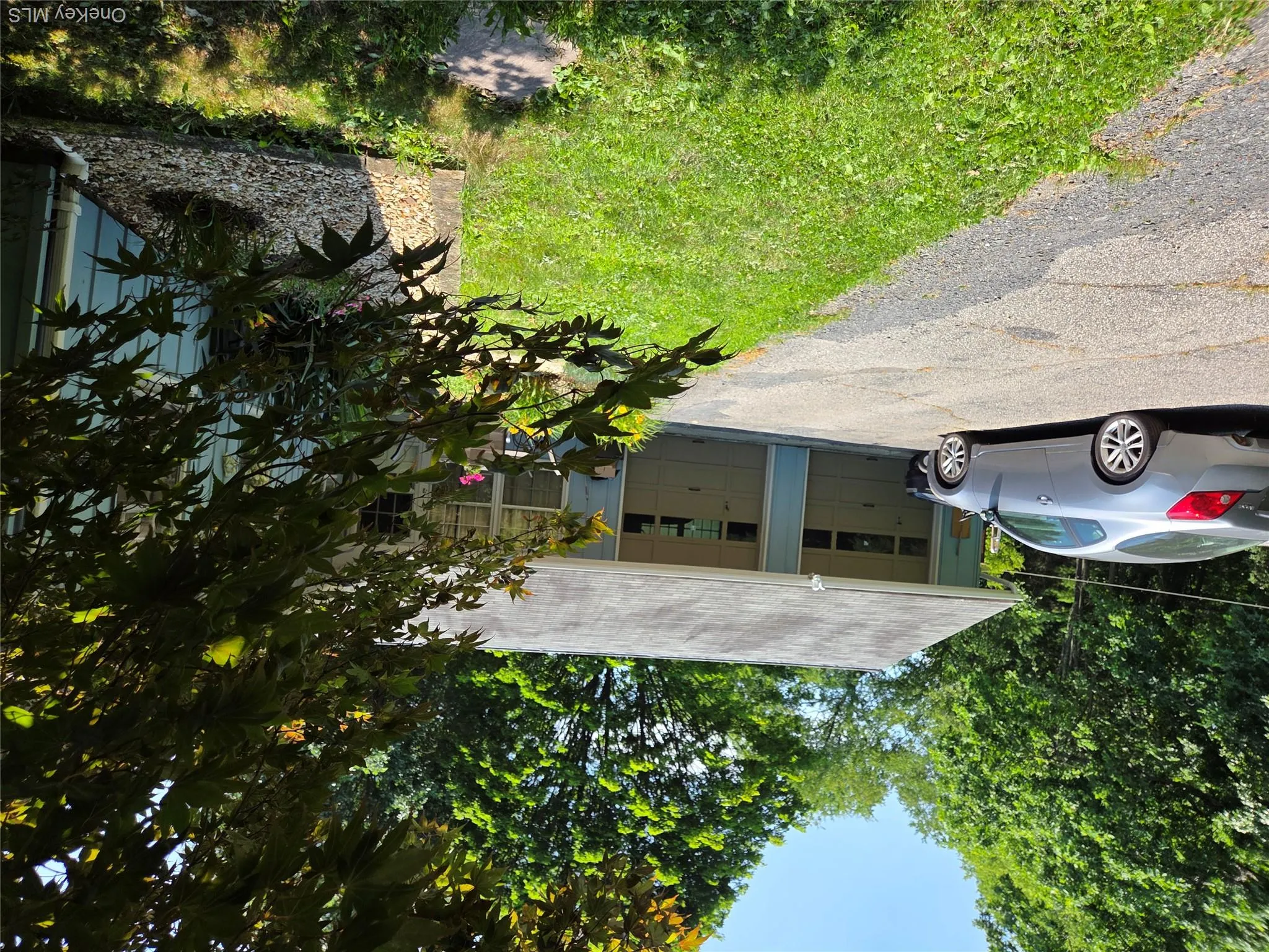 2 spacious 2car garage with a storage area above. 2 spacious 2car garage with a storage area above.