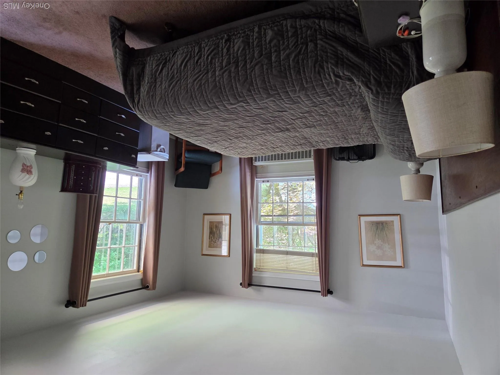 Master bedroom with plenty of window lighting. Master bedroom with plenty of window lighting.