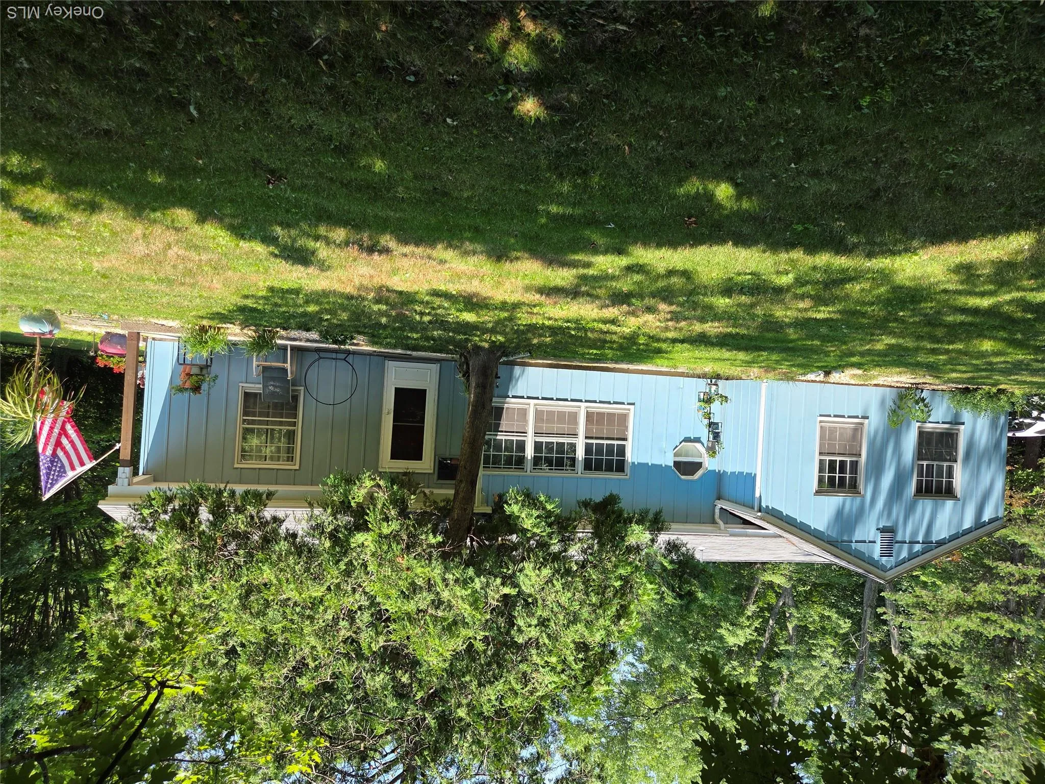 back of building with an entrance and exit to the property. back of building with an entrance and exit to the property.